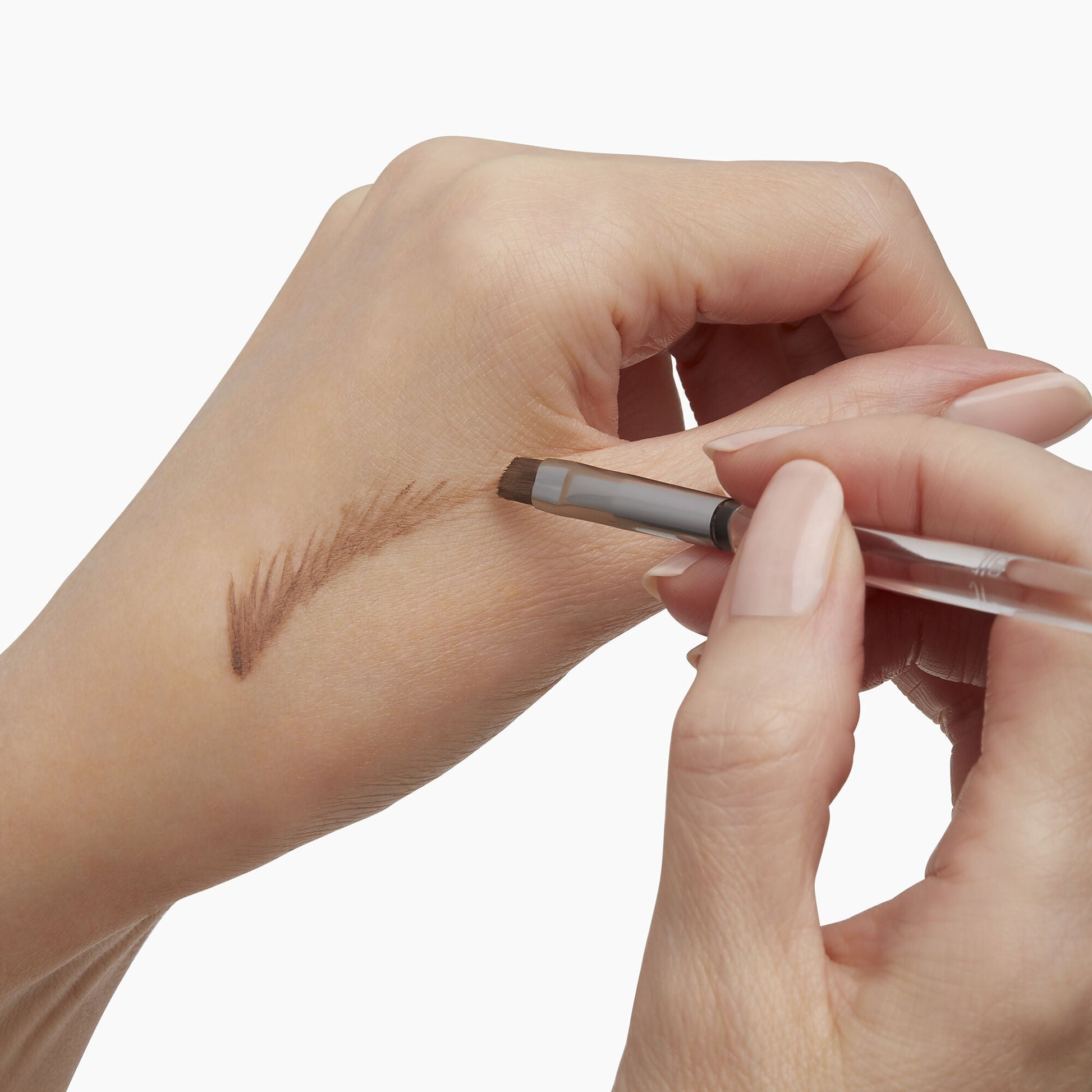 precision-dual-sided-eyebrow-brush-t4 85315_PrecisionDualSidedEyebrowBrush_Model_V2.jpg